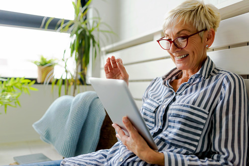 older woman on ipad